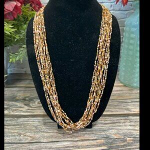 Multicolor 10 Strand glass seed bead necklace. ITM101